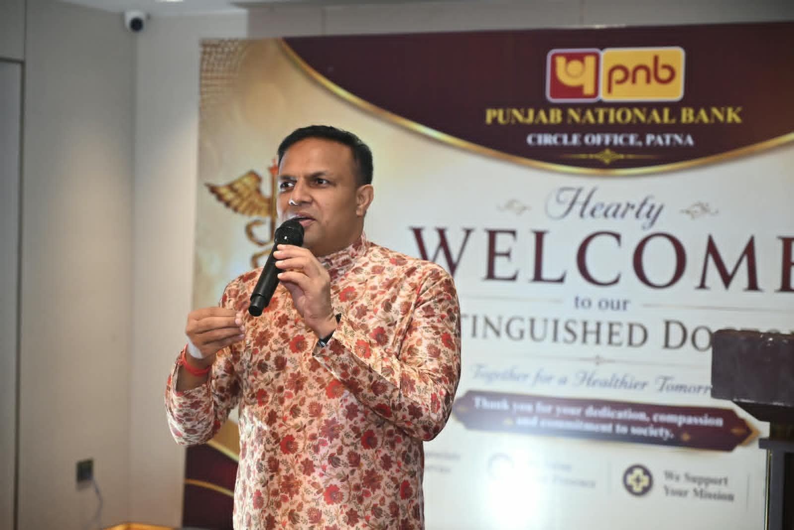 Speaker addressing guests at a formal event